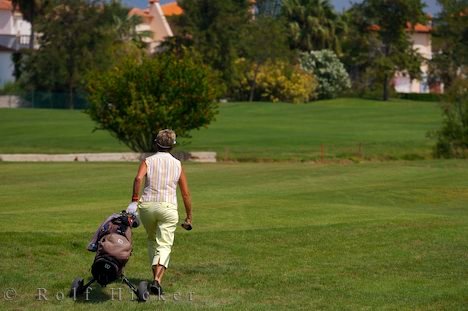 Golausruestung Golfclub Golfspielerin